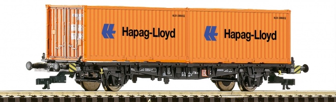 Flat car with containers<br /><a href='images/pictures/Roco/228343.jpg' target='_blank'>Full size image</a>